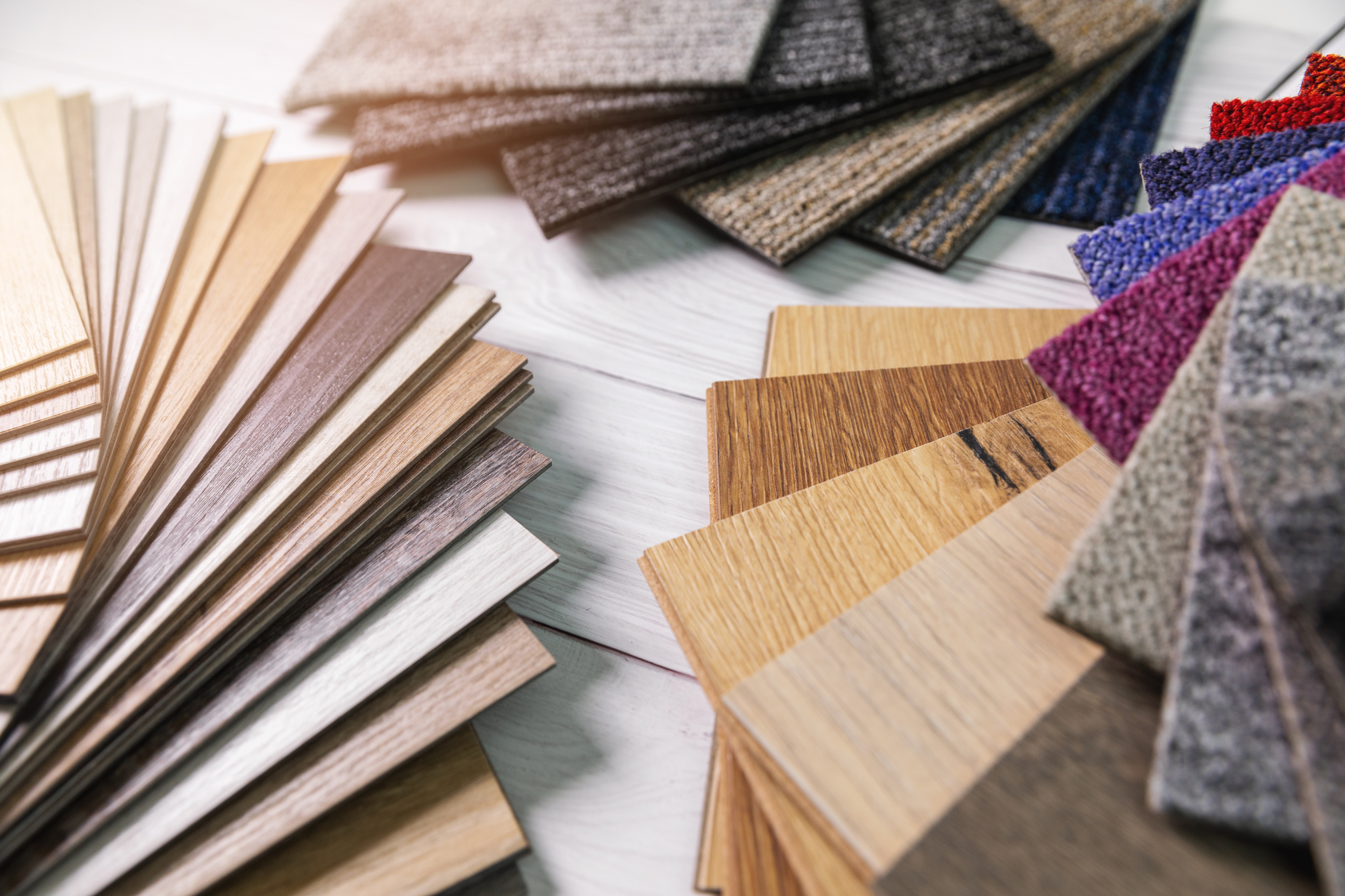 flooring and furniture materials - floor carpet and wooden laminate samples